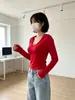 Camiseta de manga larga con capucha para mujer, estilo fino de otoño e invierno, corte ajustado, sexy, top corto, moderno, camiseta base sexy para llevar debajo