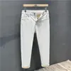 Novos Jeans Masculinos Primavera Novo Ligeiramente Solto Slim Reto Calças Bege Básico Alta Qualidade Calças Masculinas
