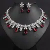 Nuevo conjunto de collar y pendientes de flor y hoja de circón colorido transfronterizo con gota de agua de circón, cadena de clavícula de lujo ligero de alta resistencia para mujer