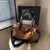 Bolso de mano retro transfronterizo para ir al trabajo, bolso de mujer de gran capacidad, nuevo bolso tote de moda de alta gama casual para viajes 2026