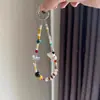 Gatinho brincalhão DIY feito à mão caseiro corrente para celular com contas nicho cor infantil desenho animado tridimensional corrente de câmera ccd