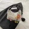 Bolsa de Ombro Artística Tendência Estilo Francês para Mulheres Verão 2025 Doce Menina Cool com Design Floral Plissado para Passeios Bolsa Transversal