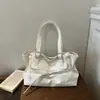 Bolsa tote de nicho transfronteiriça para mulheres, novo modelo 2026, bolsa de mão versátil de alta qualidade para o dia a dia, bolsa de ombro, bolsa de axila