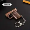Ts-T025 Pistola Simulação Transfronteiriça Dois-em-Um Luz Branca Iluminação Chaveiro Brinquedo Alívio de Estresse Sensação Mecânica Pingente