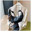 Bolso de mano informal retro de cuero suave para mujer, nuevo bolso cruzado ligero y versátil de moda 2026, bolso de hombro de nicho súper popular, bolso de axila