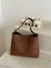 Bolso de mano retro minimalista de ante para mujer, nueva colección 2026, bolso de hombro para el día a día, bolso tipo cubo de gran capacidad, estilo transfronterizo