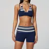 Nuevo conjunto de yoga de lunares Zechuang con tirante halter, diseño de dos piezas falso, conjunto deportivo de secado rápido para correr y fitness 4549