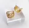 Pendientes de Metal Estilo Ins Europeo y Americano Elegantes Forma de C Múltiples Capas Huecos Joyería de Lujo Accesible Pendientes para Mujer Pendientes