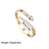 Europa y Estados Unidos ventas calientes transfronterizas joyería personalizada estilo ins forma de serpiente espiritual diseño de diamante hueco acero titanio chapado en oro pulsera