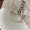 Pulseira Retro Francesa de Luxo Leve com Pérolas Cintilantes Design de Luxo Leve Exquisito de Nicho Sentido de Design Personalizado de Alto Valor Pulseira Versátil