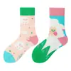 Calcetines originales de moda infantil AB color asimétrico dibujos animados longitud media otoño e invierno caramelos lindos calcetines de algodón para niños y niñas