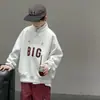 Sudadera con cuello alto para niño Estilo Primavera y Otoño 2026 Estilo Nuevo Ropa para Niños Mediana y Grande Top de Manga Larga de Otoño Ropa de Otoño Niño Moderno Genial