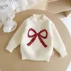 Conjunto de punto con lazo de lentejuelas rojas de Año Nuevo para niñas, Otoño Invierno, Suéter de perlas, Falda a cuadros, Conjunto de dos piezas para niños