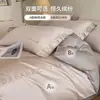 Juego de ropa de cama de lujo de cuatro piezas de algodón de fibra larga de 80 hilos, sábana bajera 100% algodón, funda de edredón bordada, juego de tres piezas de alta gama