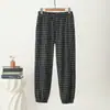 Nuevos estilos de otoño e invierno: Pantalones jogger de cuadros para mujer, cálidos, forrados de polar, de tiro alto, adecuados para madres de mediana edad, y se pueden usar como ropa exterior