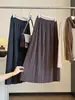 Falda Elegante de Pliegues Toothpick Estilo Francés de Longitud Media para Mujer Otoño Invierno Nueva Moda Abertura Cintura Elástica Versátil Falda Plisada