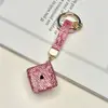 Llavero colgante de dados de arcilla con incrustaciones de diamantes, creativo, superventas transfronterizo, de alta gama, lindo, accesorio de bolso versátil, venta al por mayor