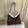 Bolsas Retrô Transfronteiriças para Mulheres 2025 Nova Coleção Outono e Inverno Versátil para o Dia a Dia Bolsa Transversal Moda Bolsa Tote de Ombro/Axila