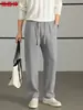 Calça casual masculina Hengyuanxiang, nova coleção outono 2026, design leve e luxuoso, calça esportiva de malha masculina, moda masculina