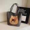 Mochila Biscuit Cat para mujer, otoño 2024, nueva bolsa de mano de estilo universitario de moda, bolso de hombro de gran capacidad de Corea del Sur.