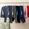 Ropa interior térmica deportiva de lyocell y acetato para niños de otoño e invierno 2026 nuevo modelo conjunto de hogar de tops y pantalones de otoño para niños y niñas