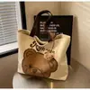2024 Tailândia Nova Bolsa de Ombro de Lona Versátil para o Dia a Dia Bolsa Tote Fofa de Grande Capacidade Mochila Escolar para Estudantes Bolsa Tote