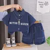 Conjunto de Ropa de Verano para Niños 2026 Nuevo Camisa de Mezclilla de Manga Corta para Niños Ropa de Verano para Bebé Conjunto de Dos Piezas Moderno Venta al por Mayor