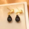 Pendientes Rojos de Gota de Agua de Año Nuevo, Populares en Xiaohongshu, Pendientes de Gota de Esmalte con un Toque de Lujo, Modernos, Elegantes, Versátiles y con Estilo, Tachuelas