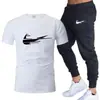 Traje casual de color liso para hombre de verano transfronterizo 2024 Camiseta de algodón de cuello redondo + Pantalones Moda Dos piezas