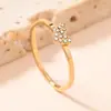 Anillo Transfronterizo Nuevo de Acero Inoxidable para Mujer Estilo Frío Dorado Simple Lujo Ligero Diamante Micro 1.5mm Anillo de Acero de Titanio Fábrica