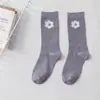 Calcetines de estilo elegante de media pantorrilla para Primavera y Verano, calcetines de mujer ins, calcetines de flores pequeñas, calcetines de personalidad universitaria, calcetines de canalé de moda, calcetines de puesto, venta al por mayor