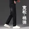 Jeans rectos de alta gama para hombre, nuevo estilo 2026, corte holgado, acabado lavado, elásticos, casual, pantalones de otoño, modernos y versátiles para hombre