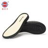 Suela de cristal anti-patada zapatillas tejidas a mano con gancho suela de tendón de res zapatillas de flor abullonada suela al por mayor niño vaca