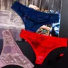 Ropa interior transparente para mujer mostrando lana y exponiendo sexy encaje de malla de tiro bajo sin costuras calzones tanga para mujer