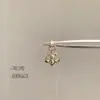 Pendientes de acero de titanio 316L en la colección café dorado claro, ear cuffs minimalistas de circonita, pendientes de alta gama personalizados con forma de corazón para mujer, lujo ligero
