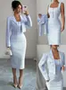Nuevo conjunto de dos piezas para mujer de otoño europeo y americano, abrigo largo de estilo retro francés con solapa y elegante vestido tipo chaleco