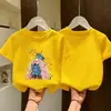 Camiseta de Algodão Puro de Manga Curta para Meninas Top de Verão 2026 Nova Estilo Coreano Infantil Solta Estilosa Estampa de Desenho Roupas de Verão