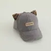 Boné de beisebol infantil transfronteiriço Outono Novo estilo Meninos e meninas Boné bico de pato Comércio exterior Estampa de leopardo Orelha Lã de cordeiro Chapéu de bebê