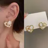 Pendientes de Clip de Lujo Ligero Estilo Hong Kong sin Agujeros para Orejas Pendientes Geométricos de Perla y Camelia para Mujer Sentido Avanzado Simples Elegantes Pendientes Versátiles