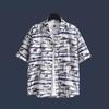 Camisa Estampada Floral Vintage Masculina e Feminina Solta Tendência Versátil Estilo Preguiçoso Camisa de Manga Curta para Casal Estilo Japonês Camisa Floral de Praia Tendência