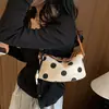 Elegante bolso de mano de lunares blanco y negro para mujer, bolso pequeño, nuevo modelo de moda de verano 2026, versátil, para el día a día, bandolera