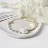Novo Bracelete da Sorte Estilo Chinês para Mulheres, Bracelete de Sementes de Lótus, Bracelete Exquisito de Luxo Leve de Nicho, Joia de Mão com Corda Vermelha