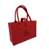 Bolsa de fieltro personalizada con caracteres de "Felicidad" y "Longevidad", bolsa de regalo de alto valor estético, bolsa de mano roja de gran capacidad estilo chino nuevo