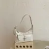 Bolso de axila retro muy elegante estilo coreano, nuevo modelo 2026, adecuado para el trabajo y los desplazamientos, elegante bolso de hombro, bolso de mano y bolso cruzado