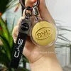 Colgante con Logo de Coche Dorado Personalización de LOGO Oro Puro 999 Llavero de Cuero Regalo para Dueño de Coche Tráfico Conducción Colgante Venta al por Mayor