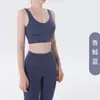 Nuevo conjunto de yoga y fitness de alta elasticidad sin costuras para mujer, con un diseño de cintura alta con forma de durazno para realzar los glúteos, adecuado para correr y entrenar, un conjunto de dos piezas