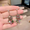 Brincos de Disco de Cristal Brilhante Estilo Retrô de Luxo Leve Nicho Único Popular Elegante Versátil Brincos para Mulheres