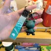 Llavero de oso de color de dibujos animados creativo, colgante de oso dragón con degradado de estrellas, colgante de bolso, máquina expendedora, regalo pequeño, venta al por mayor