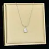 Cadena para Clavícula con Colgante de Corazón Pequeño de Moda Acero de Titanio Sin Decoloración Diseño de Nicho Cadena Dorada Simple de Gama Alta Joyería para Mujer