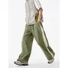 Calça de Malha com Zíper Color-Blocked para Homens Verão 2025 Nova Moda Estilo Hong Kong Solta Casual Versátil para Exterior Calças Longas